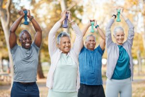 Fitness, weights and senior people in park for healthy body, wellness and active workout outdoors. .