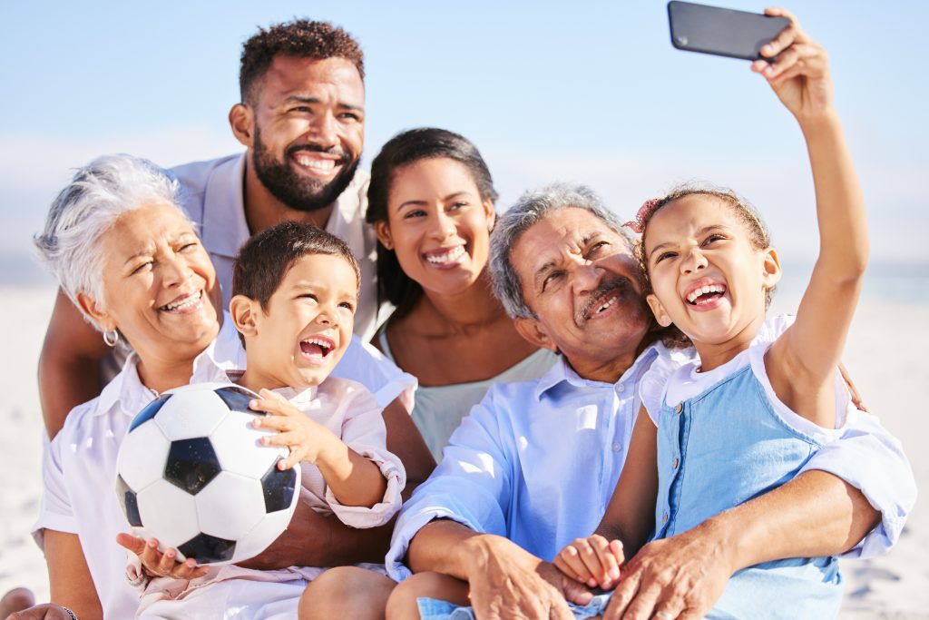 Multi ethnic family taking a selfie to capture and document beautiful moments together. Family with.